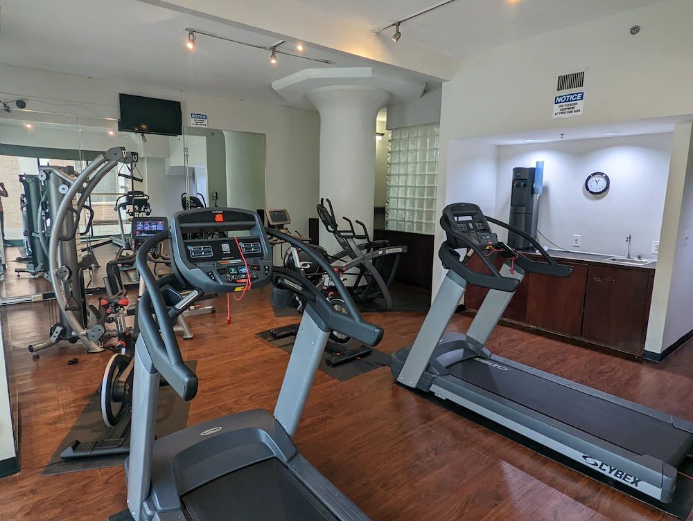 Fitness center at Atheneum Suite Hotel